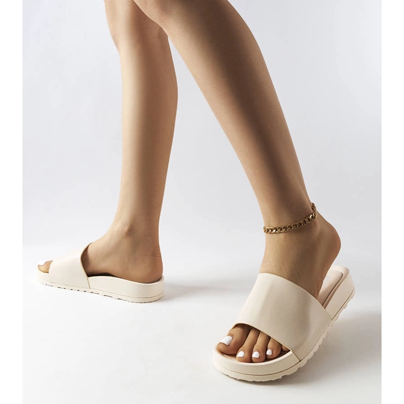 Beige rubber slides from Sabourin 2