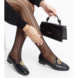 Black loafers with gold embellishment from Bergeron 1