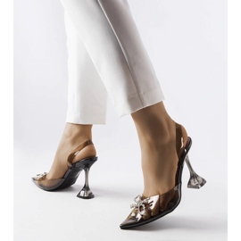 Black transparent pumps from Girard 1