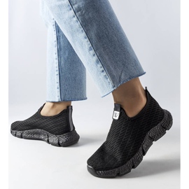 Black slip-on sneakers from Yellville 1