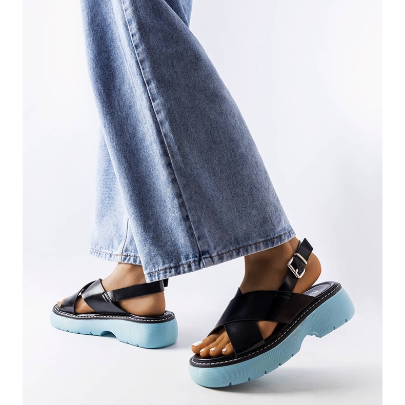 Black sandals on a blue platform from Rozana 1