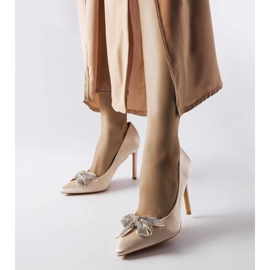 Beige pins with a satin finish and a Mia bow 1