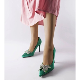 Green pins with a satin finish and a Mia bow 1 Green pins with a satin finish and a Mia bow 1