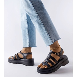 Black sandals with tract soles from Saidi 1