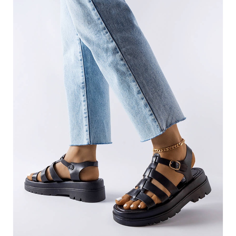 Black sandals with tract soles from Saidi 1