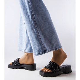 Black slippers with tractor soles from Lora 2