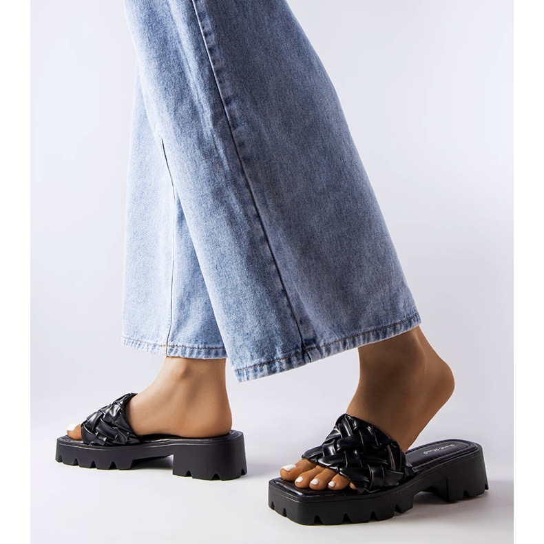 Black slippers with tractor soles from Lora 2