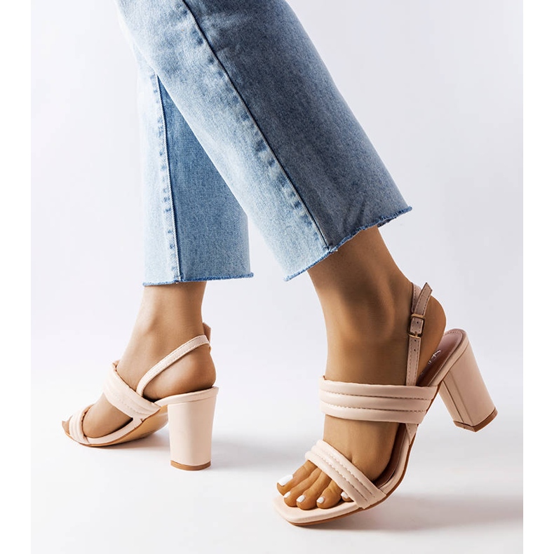 Beige sandals on the Moli post 1