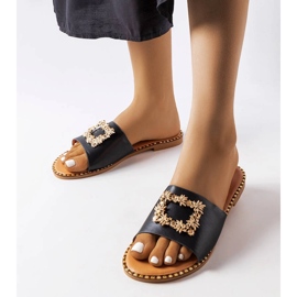 Miriam's black embellished flip-flops 1