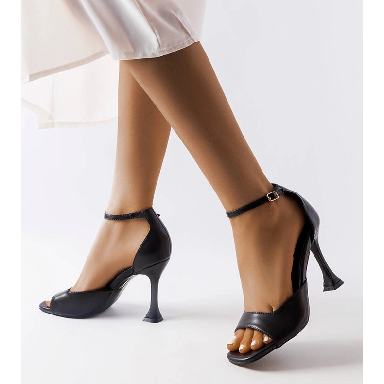Black heeled sandals with a strap from Delinda 2