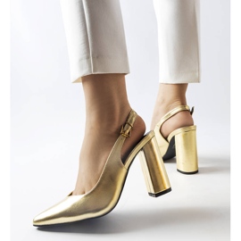 Gold open heel pumps from Wechsler golden 1