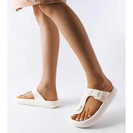 White flip flops on the Moretti platform 2