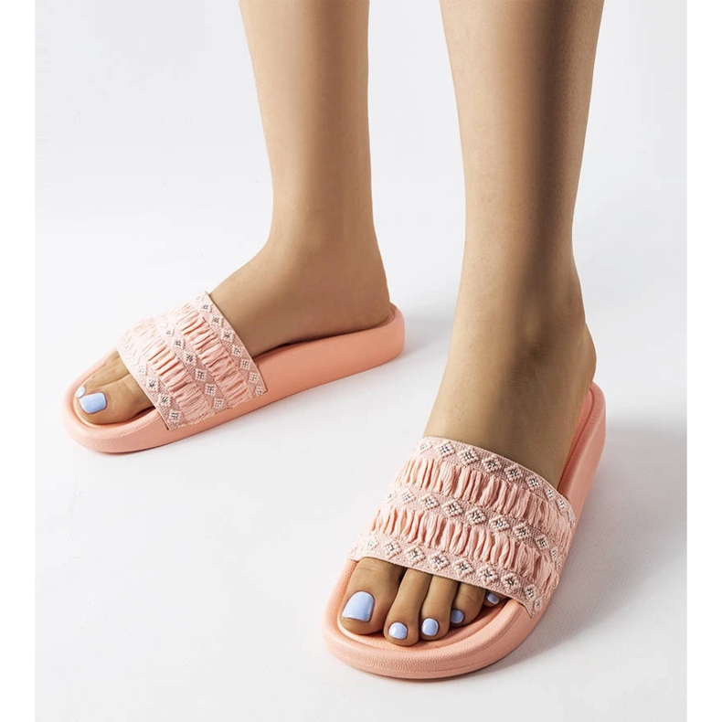 Ernest's pink ruffled slides 1