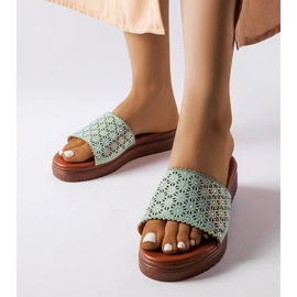 Green openwork sliders with zircons from Irvine 1