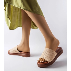 Beige slides with an openwork upper from Idabel 2