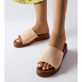 Beige slides with an openwork upper from Idabel 1