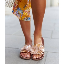 Gold flip-flops with a decorative upper from Caggio golden 1