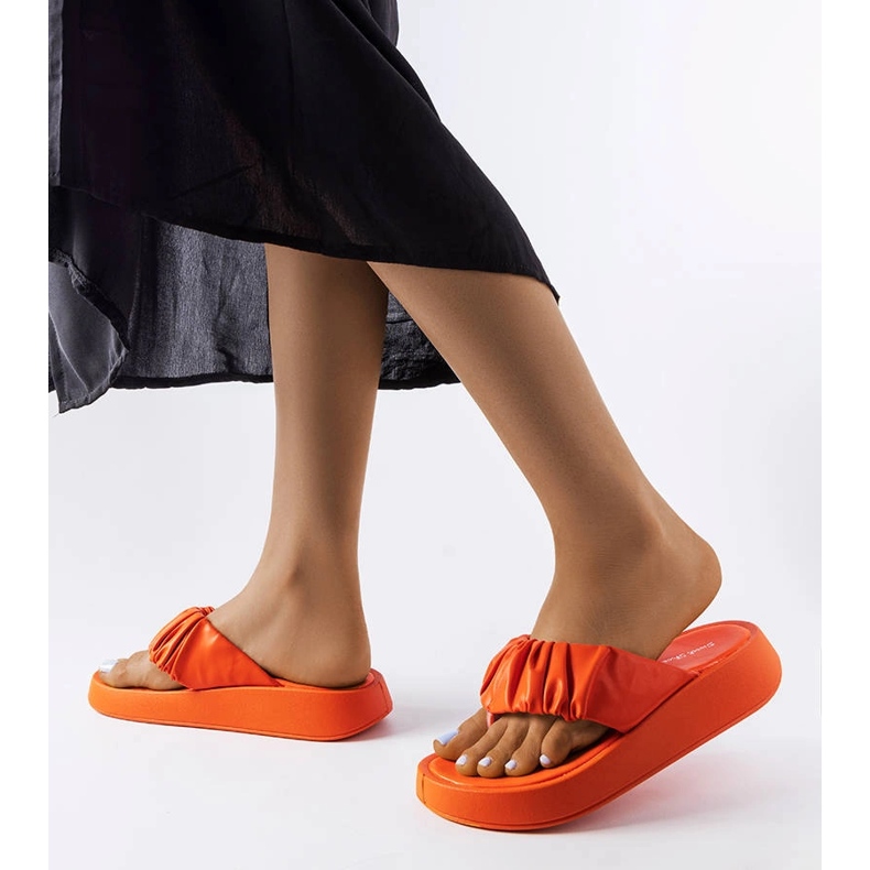 Orange ruffled flip-flops 2