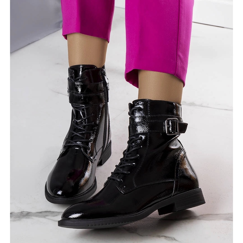 Black insulated patent leather boots from Pompi 1