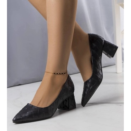 Black heeled pumps from Migne 1