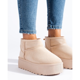 Beige short snow boots on the Shelovet platform 2