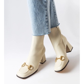 Beige block heel boots from Castione 1