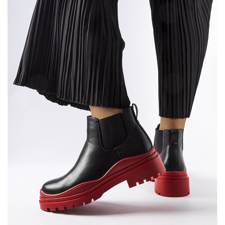 Black ankle boots on a colorful Marinone platform 1