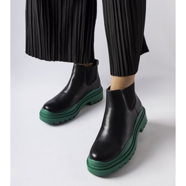 Black ankle boots on a colorful Marinone platform 1