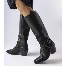 Black cowboy boots on the post 1