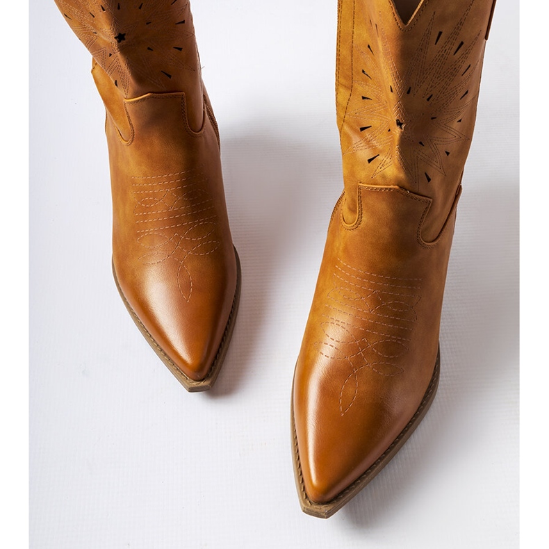 Brown cowboy boots with an embellished Leopardi upper 1