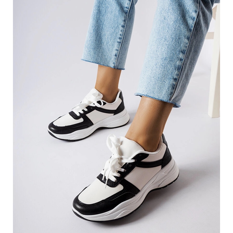 Black and white shoes with snakeskin accents from Diego 1