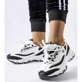 White and black sports sneakers by Kouri 2