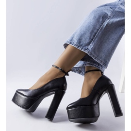 Black high heel pumps from Hervé 2