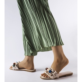 Beige ruffled slides from Fortier black 1