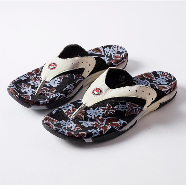 Suoma black textile flip-flops with flowers 1
