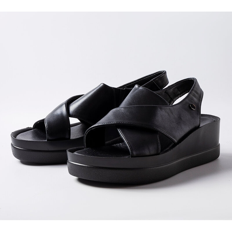 Black low wedge sandals from Adelina 1