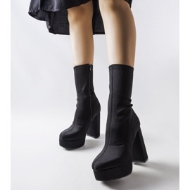 Black satin boots on a massive post from Glus 1