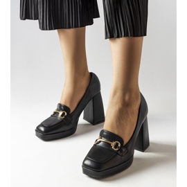 Black pumps on a geometric block from Blaiss 1