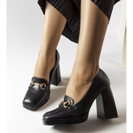 Black pumps on a geometric block from Blaiss 2