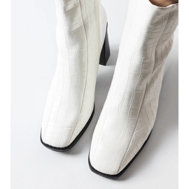 White ankle boots with imitation crocodile skin from Belluci 1