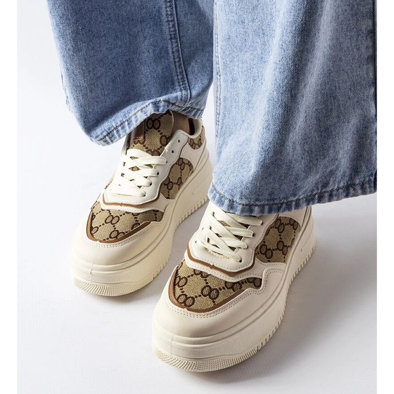 Inna Beige sneakers decorated with the Conte monogram 1