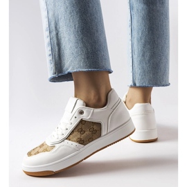 Inna White sneakers decorated with the Isidor monogram 1