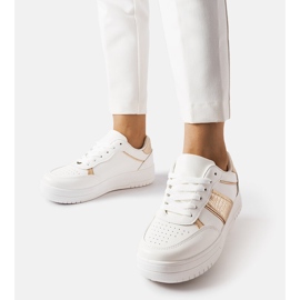 White and gold sports sneakers from Parma 1