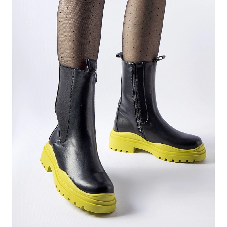 Black boots with a colored sole from Delebio 1