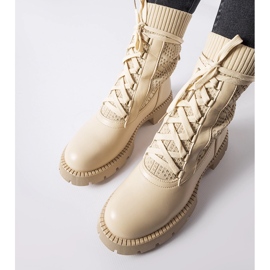 Beige openwork sock boots by Portico 1