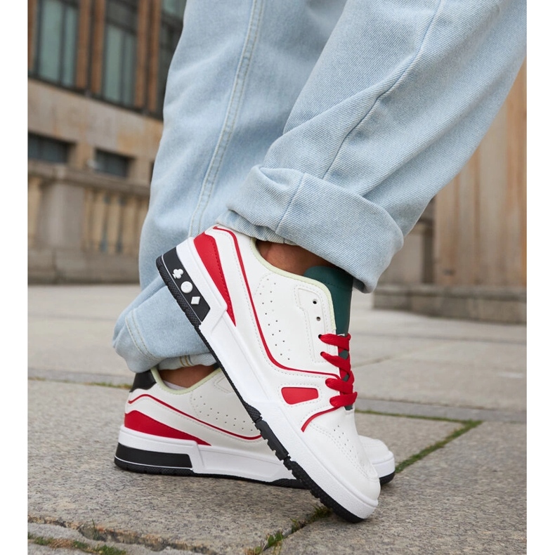 Inna Archie's white and red shoes with a green tongue 1