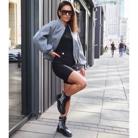 Black boots decorated with a monogram 1