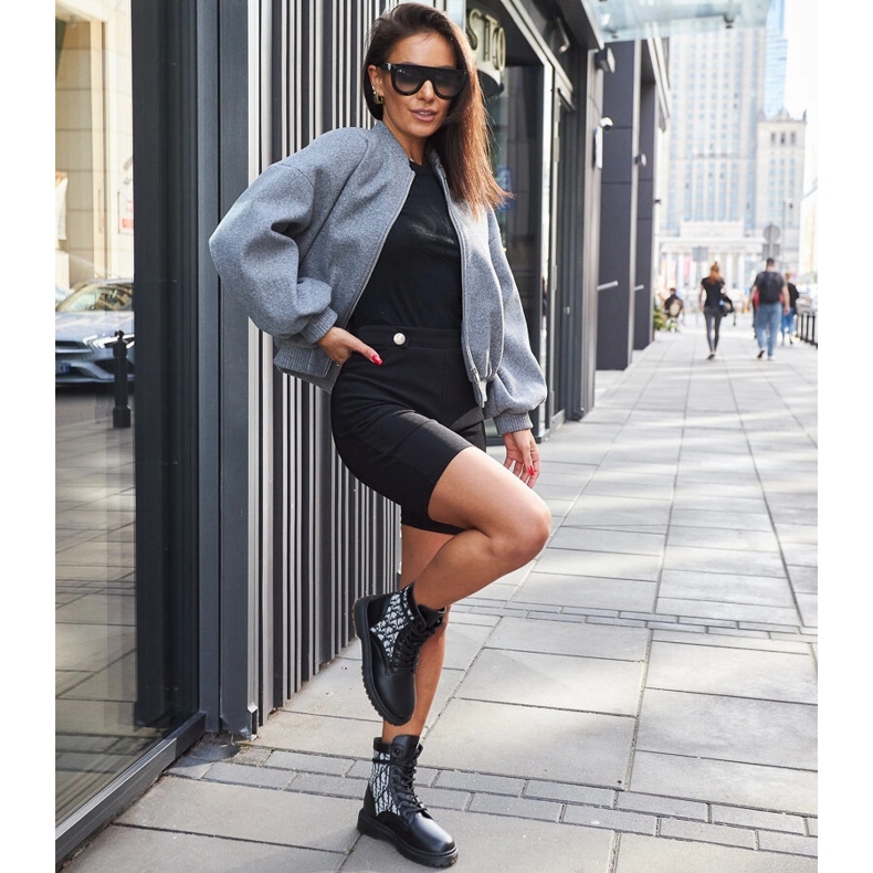 Black boots decorated with a monogram 1