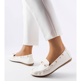 White loafers decorated with the Seattle appliqué 1