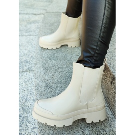 Ladies' beige boots with a beige sole 1